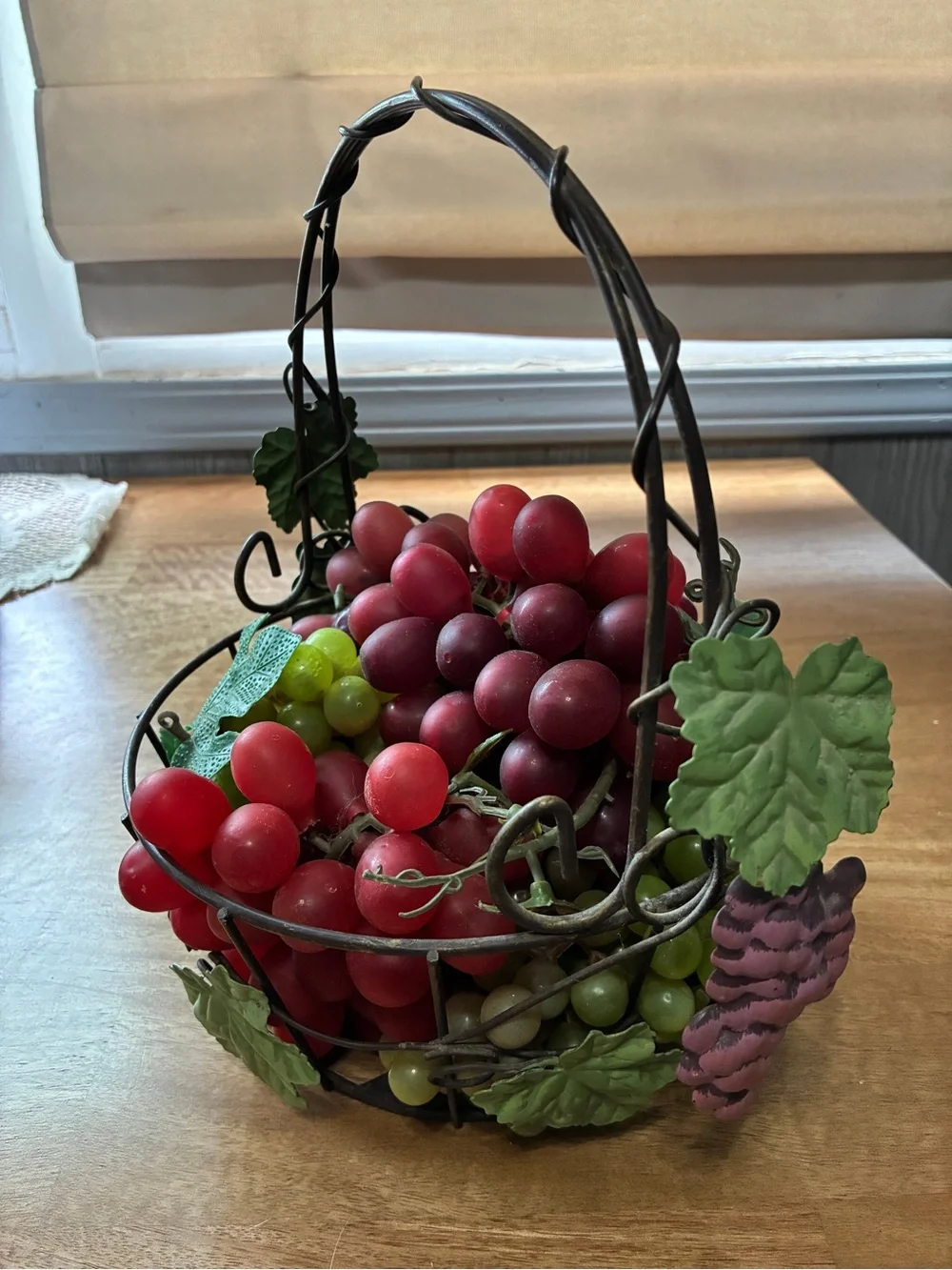 decorative artificial grape clusters, in a wire basket 8” x 10”